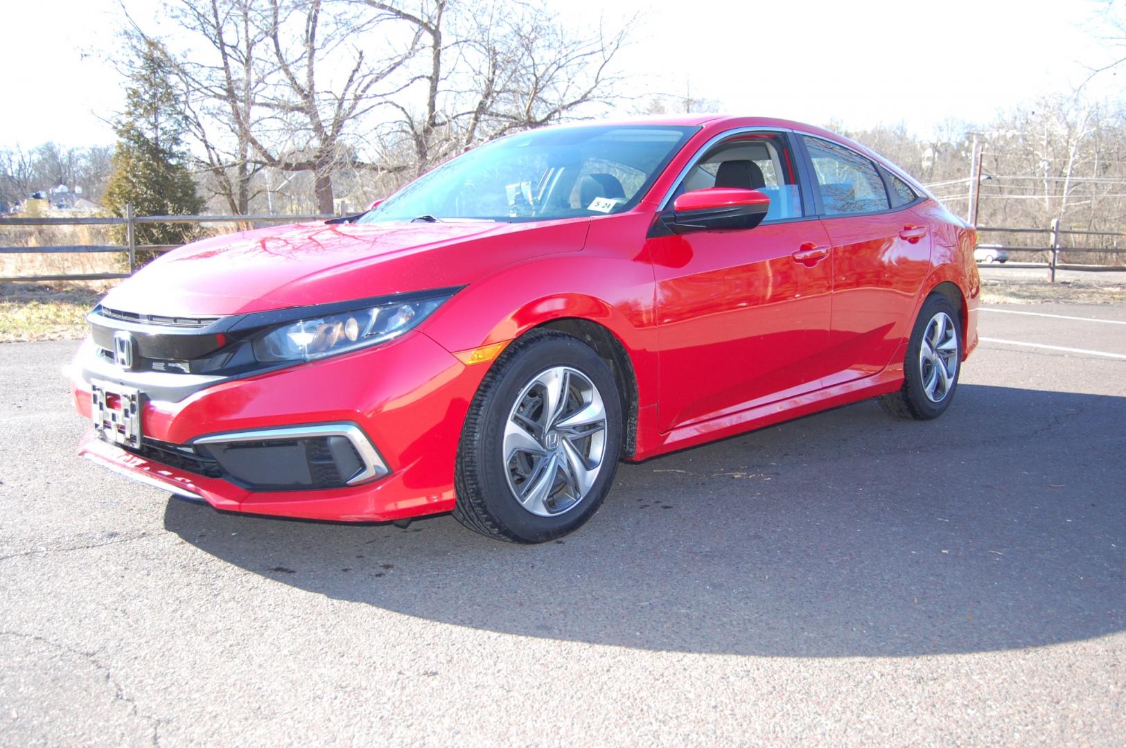 2019 RED /Black Cloth Honda Civic (2HGFC2F60KH) with an 2.0 Liter engine, Automatic transmission, located at 6528 Lower York Road, New Hope, PA, 18938, (215) 862-9555, 40.358707, -74.977882 - One family owned 2019 Honda Civic LX sedan powered by a 2.0 Liter 4 cylinder engine, front wheel drive, automatic transmission. Tilt wheel, cruise control, Dual front and side air bags, Side curtains airbags, ABS braking, AM/FM/Bluetooth/USB, Auto climate control, power windows, locks and mirrors, 1 - Photo#0